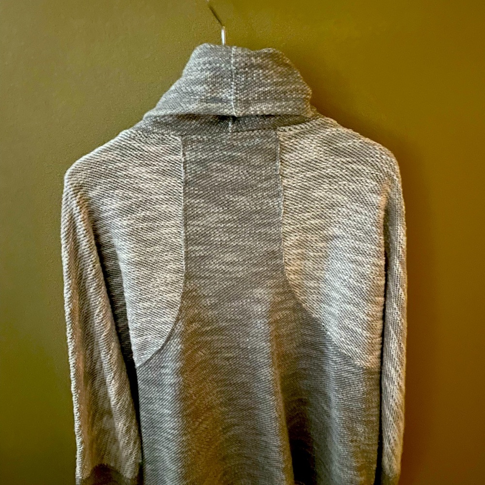 Soft and cosy loose knit grey turtleneck top from Off Sacks